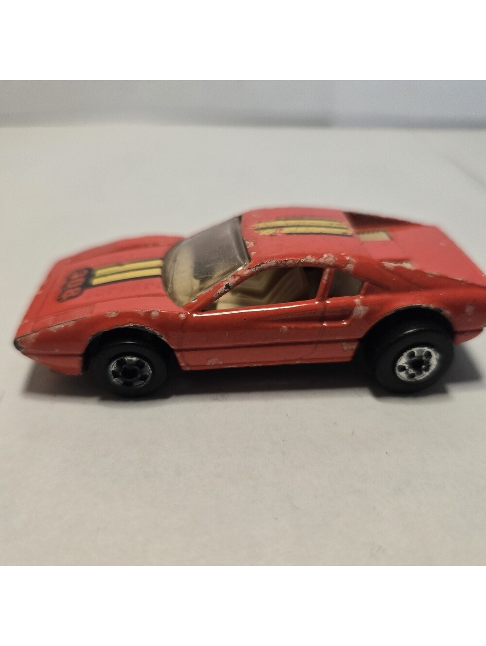 Vintage Hot Wheels Ferrari 308 Diecast Car - Red with Yellow Stripes